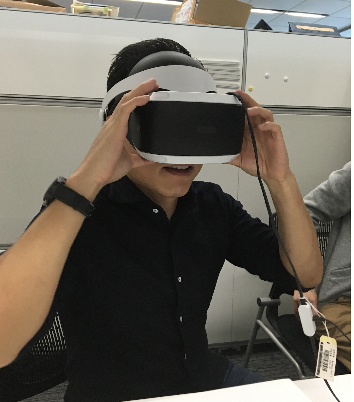 Gene Lee trying a PlayStation VR headset