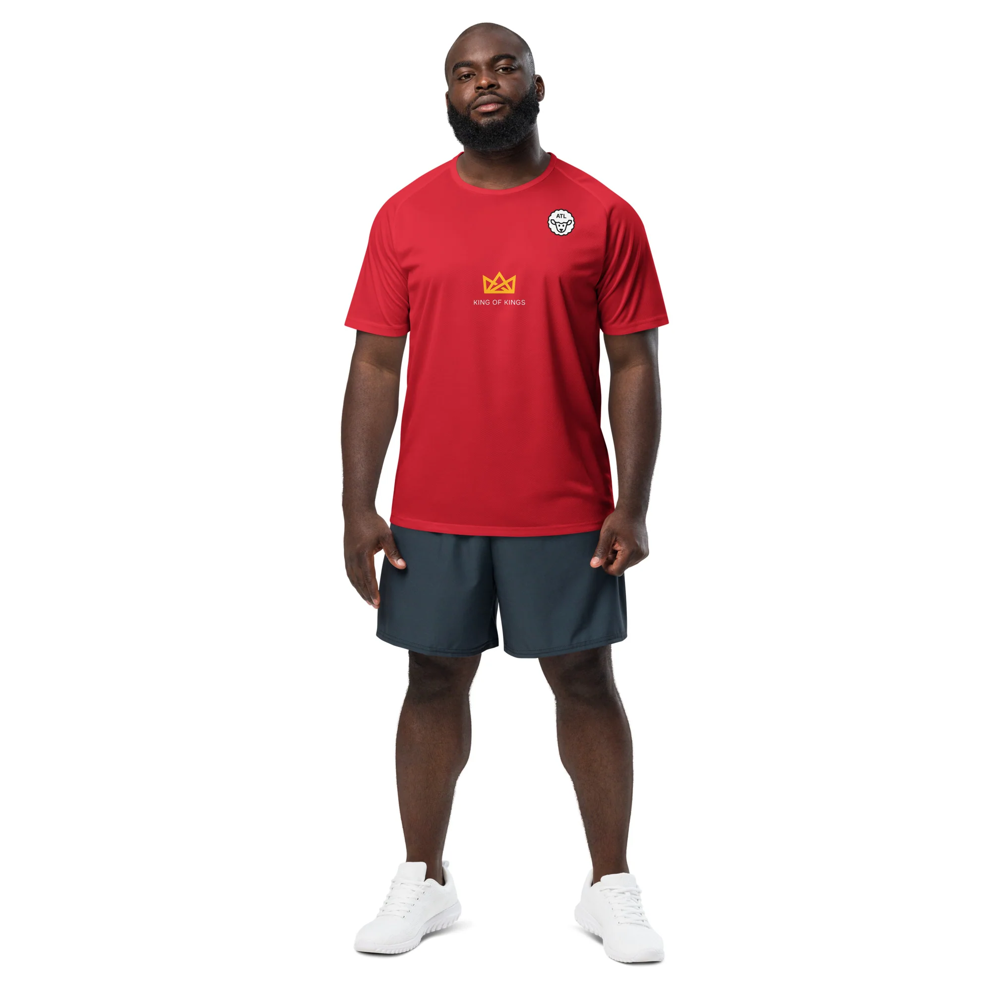 Model wearing the red Run the Race running shirt, front view, with the crown logo and ATL emblem